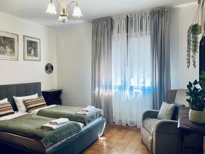 Letto o letti in una camera di San Dona Homely House