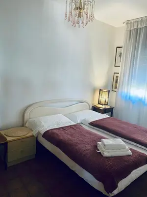 Letto o letti in una camera di San Dona Homely House