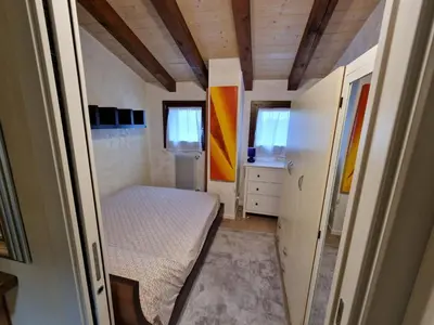 Letto o letti in una camera di LA NATURA AL MARE