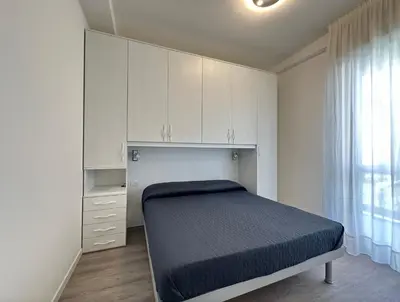 Letto o letti in una camera di Costa del sol - Carraro Immobiliare - Family Apartments