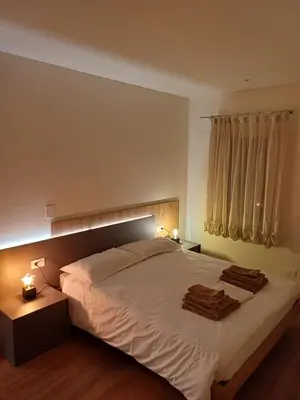 Letto o letti in una camera di G83Home-Appartamento moderno in zona Fiera