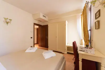 Letto o letti in una camera di Ve-nice Suite San Marco C4439