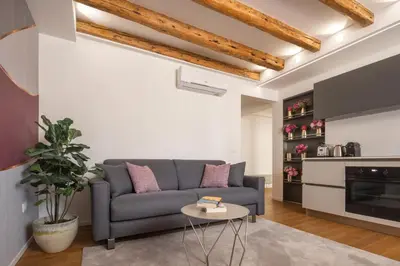 Area soggiorno di Ruga Bella Apartments R&R