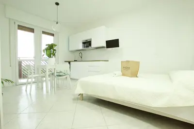 Letto o letti in una camera di Pineta Residence - Home Immobiliare Jesolo