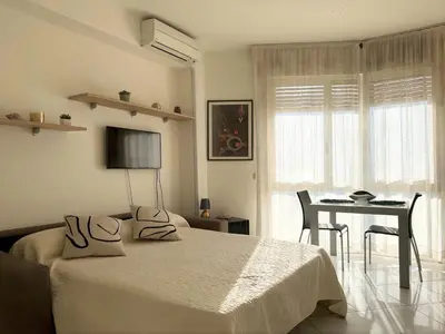 Letto o letti in una camera di Pineta Residence - Home Immobiliare Jesolo