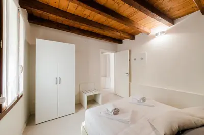 Letto o letti in una camera di Al Campiello