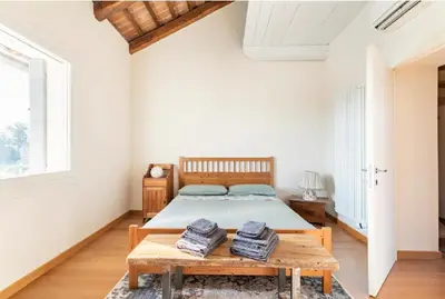 Letto o letti in una camera di Boutique House Alle Loggie Palladiane di Villa Contarini