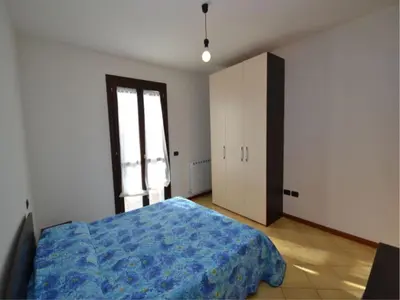 Letto o letti in una camera di Comfortable beachfront apartment