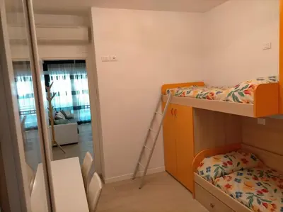 Letto o letti in una camera di Jesolo Beach Apartment