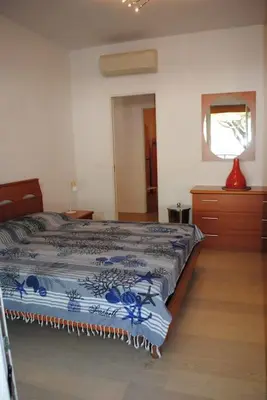 Letto o letti in una camera di Jesolo Beach Apartment