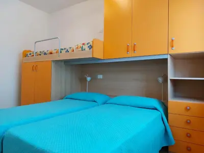 Letto o letti in una camera di Jesolo Beach Apartment