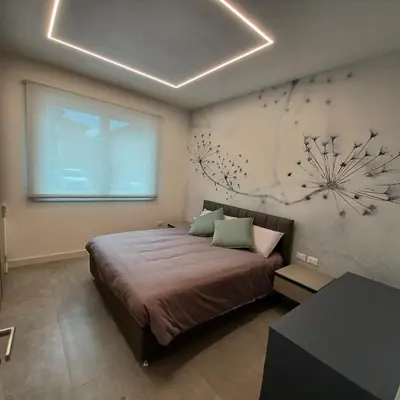 Letto o letti in una camera di Casa Ciliegi 3