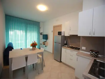 Cucina o angolo cottura di Charming flat for up to 6 guests near the beach