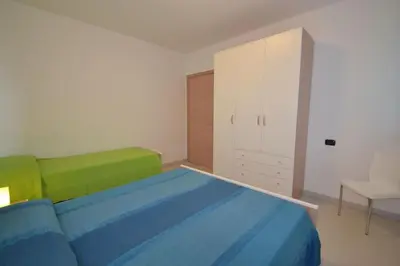 Letto o letti in una camera di Modern flat with private garden