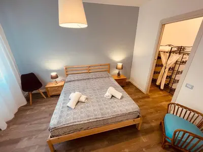 Letto o letti in una camera di Appartamento Cima - Vista Mare, 3 camere, WiFi, Family Apartment