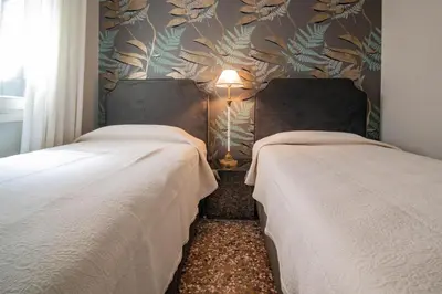Letto o letti in una camera di Rooftop San Marco
