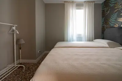 Letto o letti in una camera di Rooftop San Marco