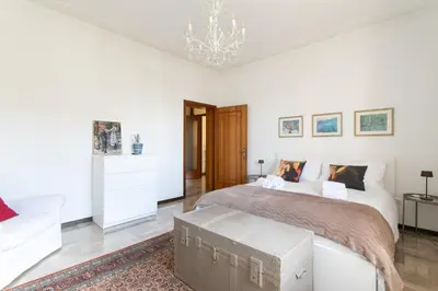 Letto o letti in una camera di Casa Cairoli