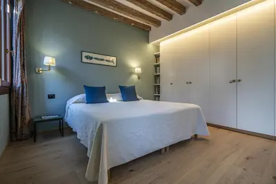 Letto o letti in una camera di Ca' Delle Vele Charming Apartment in Dorsoduro