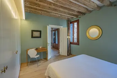 Letto o letti in una camera di Ca' Delle Vele Charming Apartment in Dorsoduro