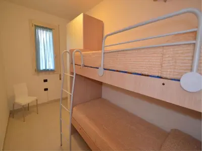 Letto o letti in una camera di Apartment in the heart of Rosolina Mare