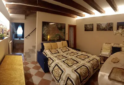 Letto o letti in una camera di Ca' Spendore del Sole