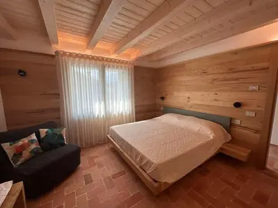 Letto o letti in una camera di Borgo Cortivi b&b