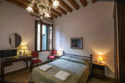 Letto o letti in una camera di CA'SALVADOR