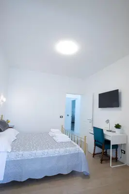 Letto o letti in una camera di BB Elite Berchet