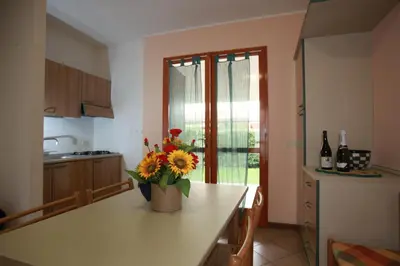 Cucina o angolo cottura di Terraced house with garden and porch