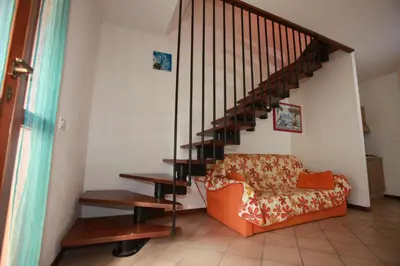 Area soggiorno di Terraced house with garden and porch