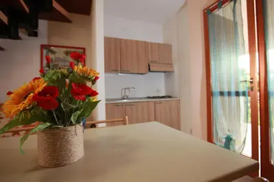 Cucina o angolo cottura di Terraced house with garden and porch