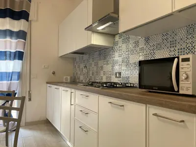 Cucina o angolo cottura di Bright apartment close to the beach