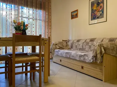 Area soggiorno di Spacious apartment for six-Beahost